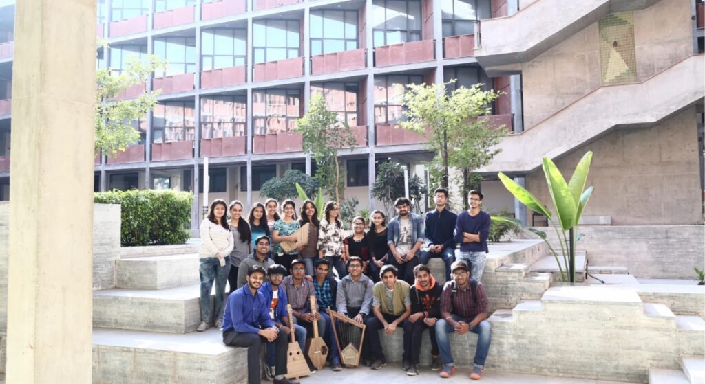 Group of students at Ahmedabad University posing together on campus.